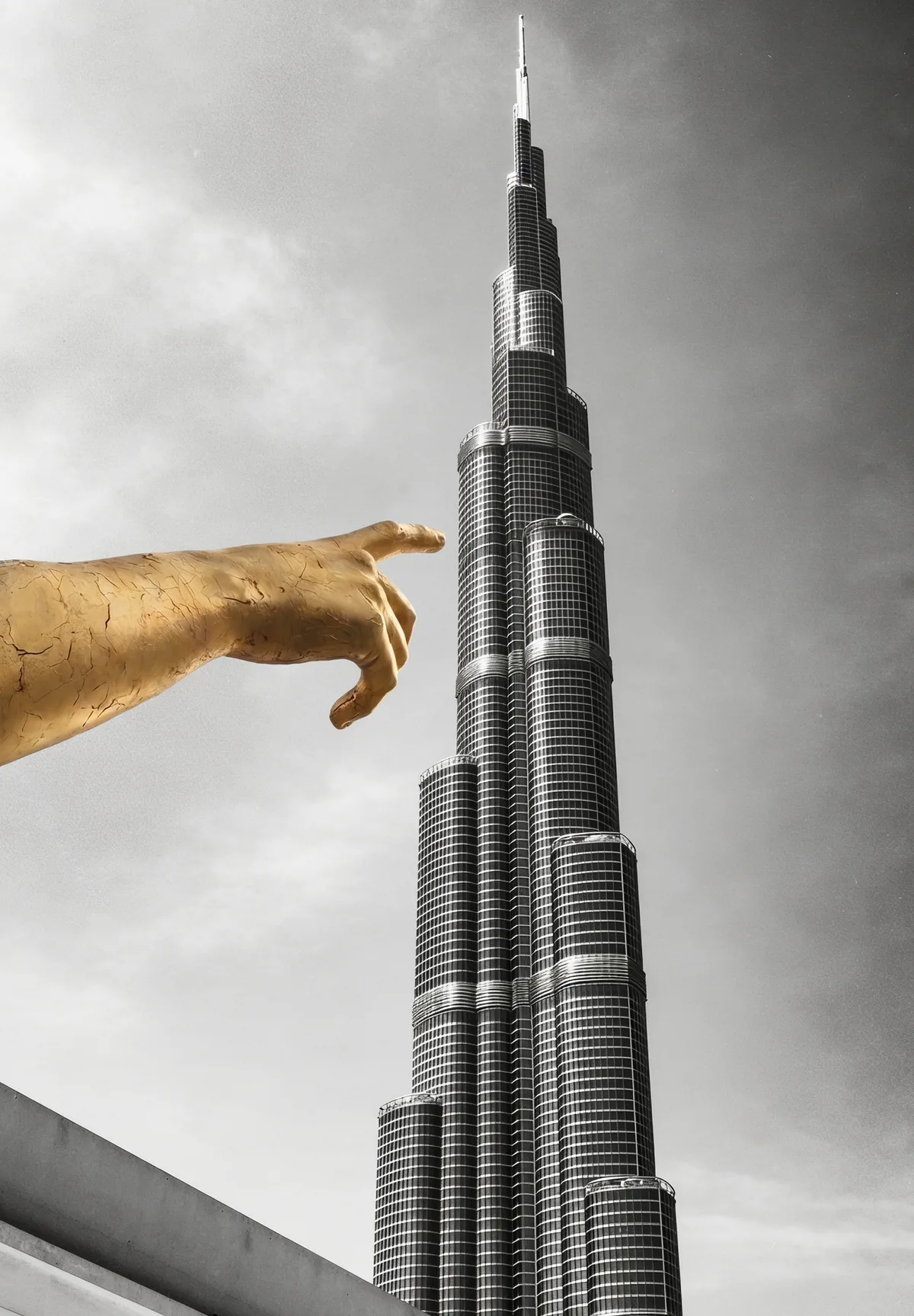 Concept: the smooth gold hand of the Jet d’Eau visual, pointing at the flank of the Burj Khalifa on a black-and-white photograph