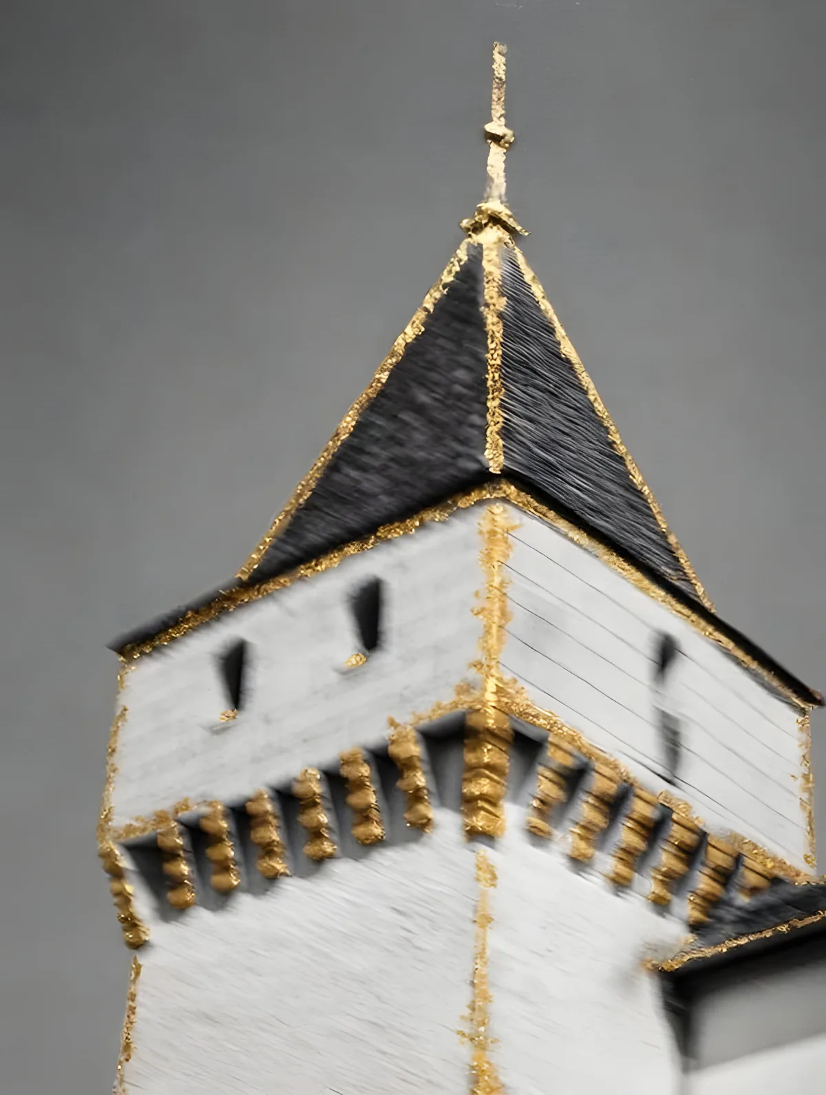 Medieval Tower: a black-and-white tower whose edges and battlements are heightened with gold leaf